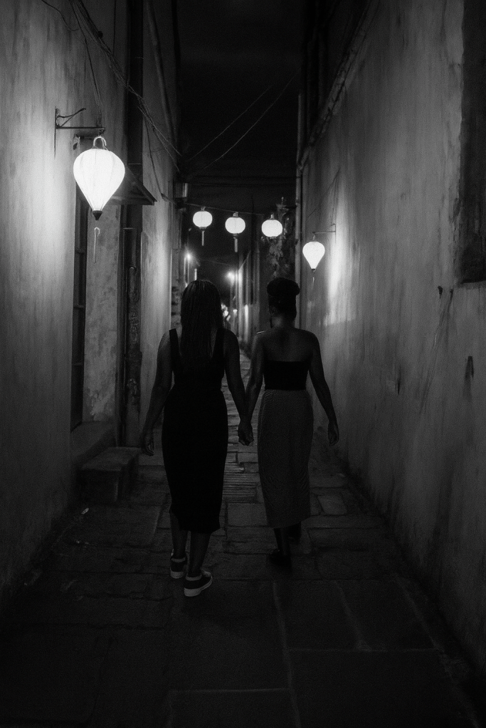 Two black women walking in an alley. Thecircleofbecoming.blog
